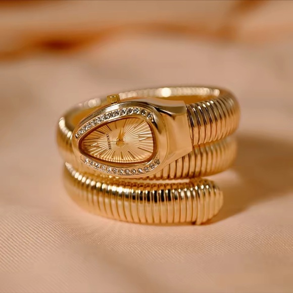 Anthropologie Accessories - Serpenti Elegant Gold Women's Watch Bracelet Set